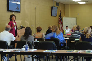 Donna Andersen speaking to organization.