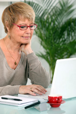 Grandmother using laptop_150x225