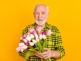 Senior Sociopath with flowers